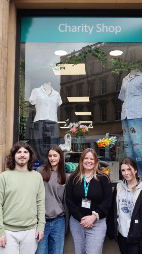 Fashion students stood outside St Margaret’s Hospice shop, Bridgewater.