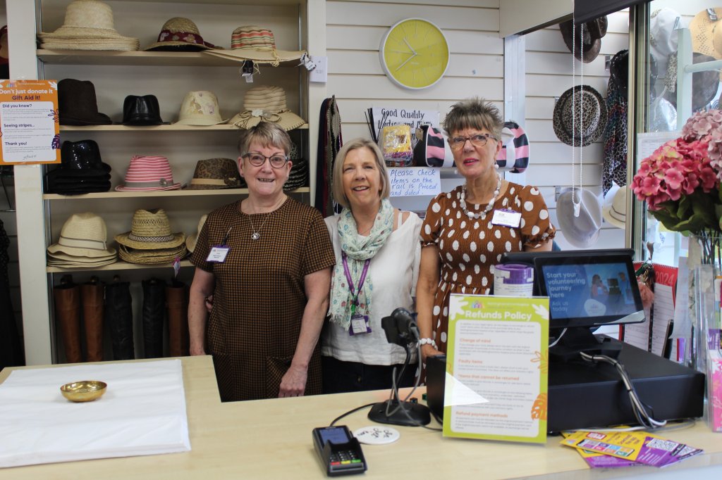 Carole, Cheryl and Cheryl behind the till.