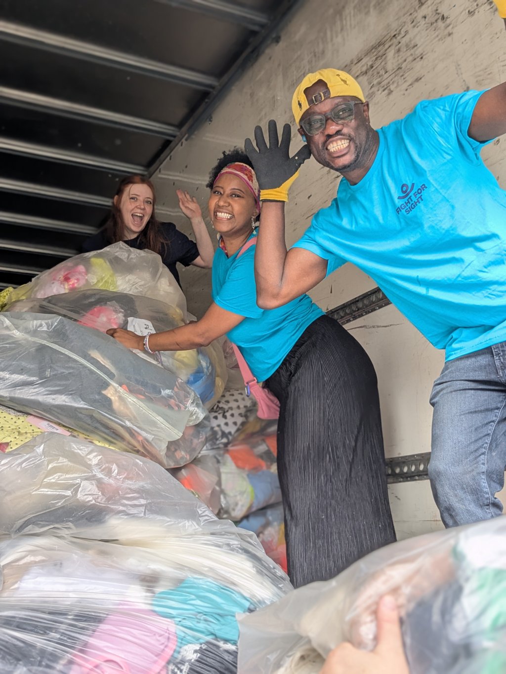 Fight for Sight staff unloading donations.