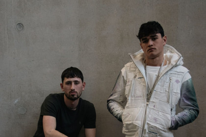 Two men modelling at the FARAxLCF event.