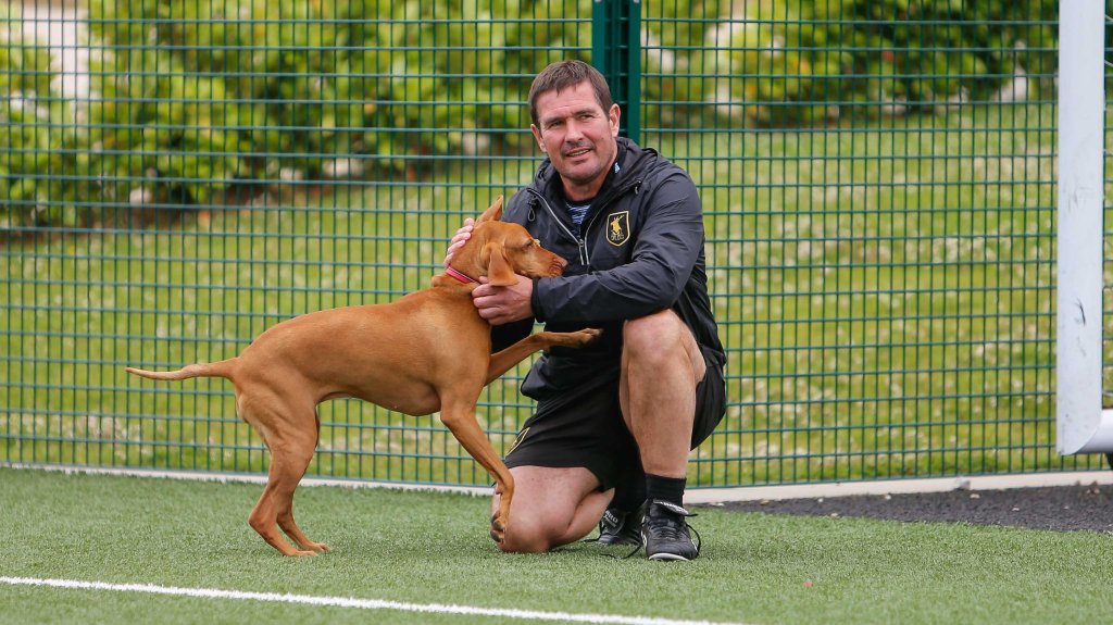 Footballer Nigel Clough, pictured with dog.