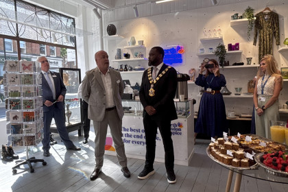 Mayor and shop staff open shop