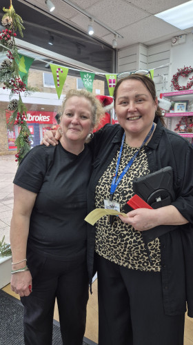 Window designer Penny McNeish and Assistant Shop Manager at Age UK Chadderton, Lisa