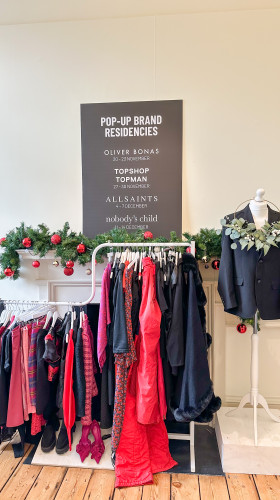 Festive clothing rail at Shelter pop-up Boutique