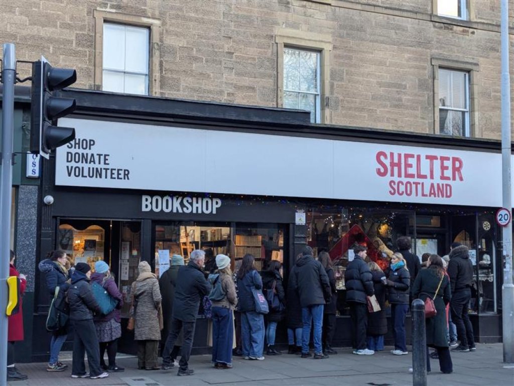 Queue of customers outside Shelter Scotland Stockbridge.