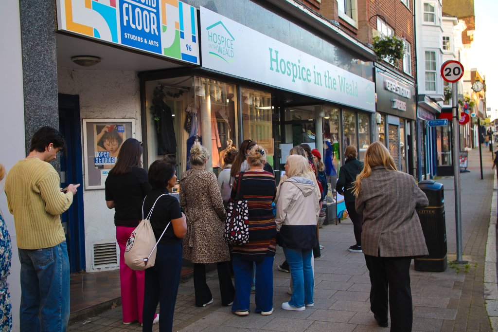 Shoppers queue outside Hospice in the Weald shop.