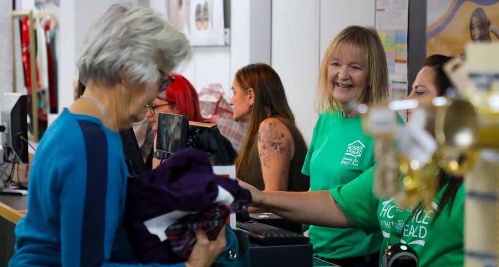 Till team at Hospice in the Weald shop.