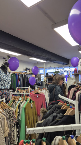 Charity shop interior with balloons