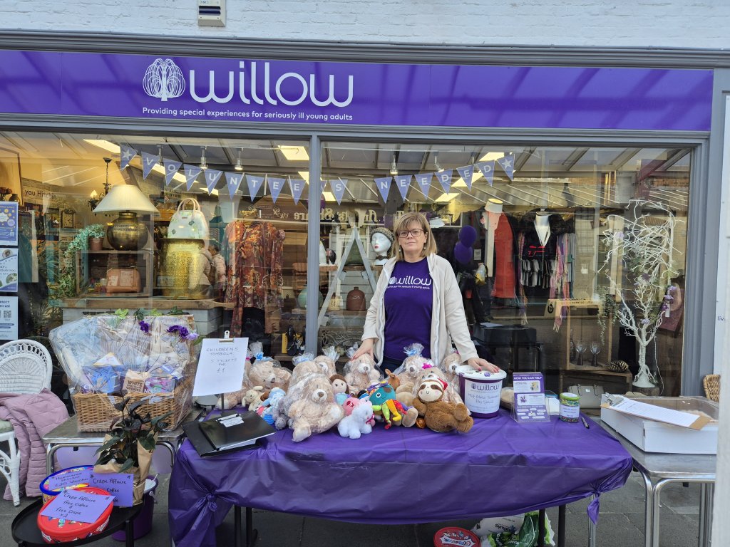 Tombola outside charity shop.