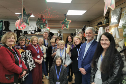 Moya Cole charity shop awards presentation group photo