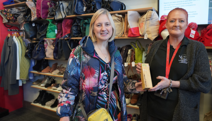 Emma Peake presenting UKFCS award to Wales Air Ambulance